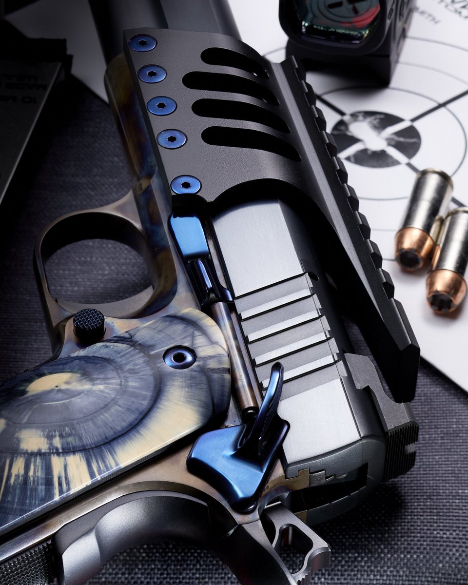 NighthawkCustom's tweet photo. One of the most spectacular projects I’ve ever seen come out of our Nighthawk Custom Shop // This is a custom 7” 10mm build brought to life through a combination of customer-supplied parts and our own in-house Nighthawk components // The Custom Shop is where we work on largely non-Nighthawk 1911s, double stacks, and HiPowers // Our team of gunsmiths in the Custom Shop are some of the most talented and well respected in the entire industry