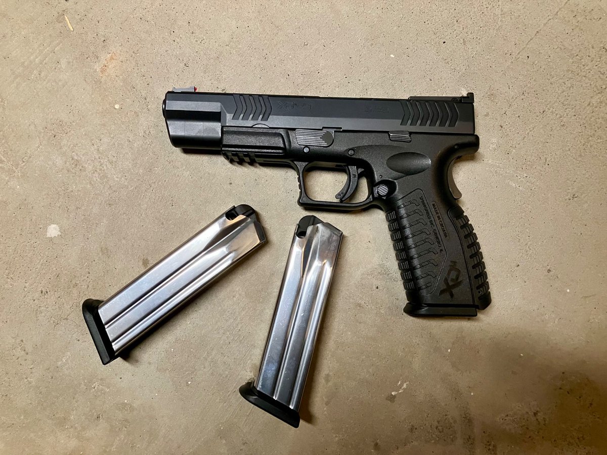 GunDibsOfficial's tweet photo. Hard to believe I got this over 15 years ago. Should I modernize her (optics cut, mag well bevel, grip stippling) or let her age with grace and just buy a modern replacement? https://t.co/VUlWMlsYLx