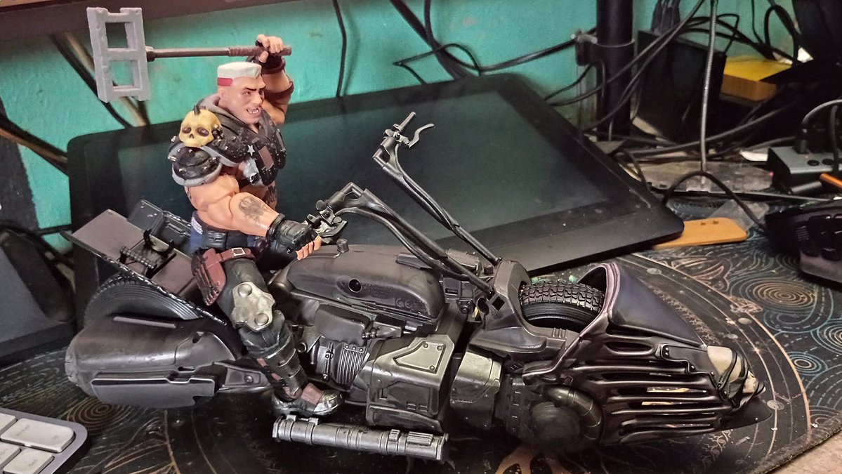 DaveFrostdusk's tweet photo. Anyone looking for a badass bike for Roadpig should look up this one. Lobo's Spacehog from the Supergirl movie made by McFarlane. There is a cover that goes over the gas tank area but I like it with it it. Plus that gives Ruckus or Zarana the ability to sit in his lap. https://t.co/QvbLfbjvy8