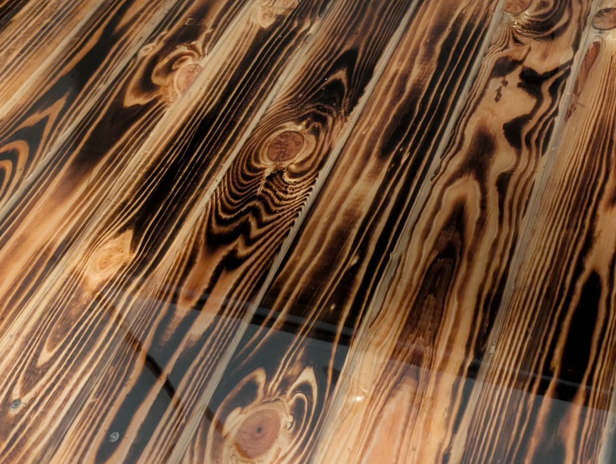 Mark17374854's tweet photo. @laurenboebert @Tommy_USA @elonmusk You like this countertop Lauren? These are 2x4s seared and then I have caulk in between and I poured epoxy on. I think it's awesome. I've gotta clean up the sides. https://t.co/juMkyYsAnL