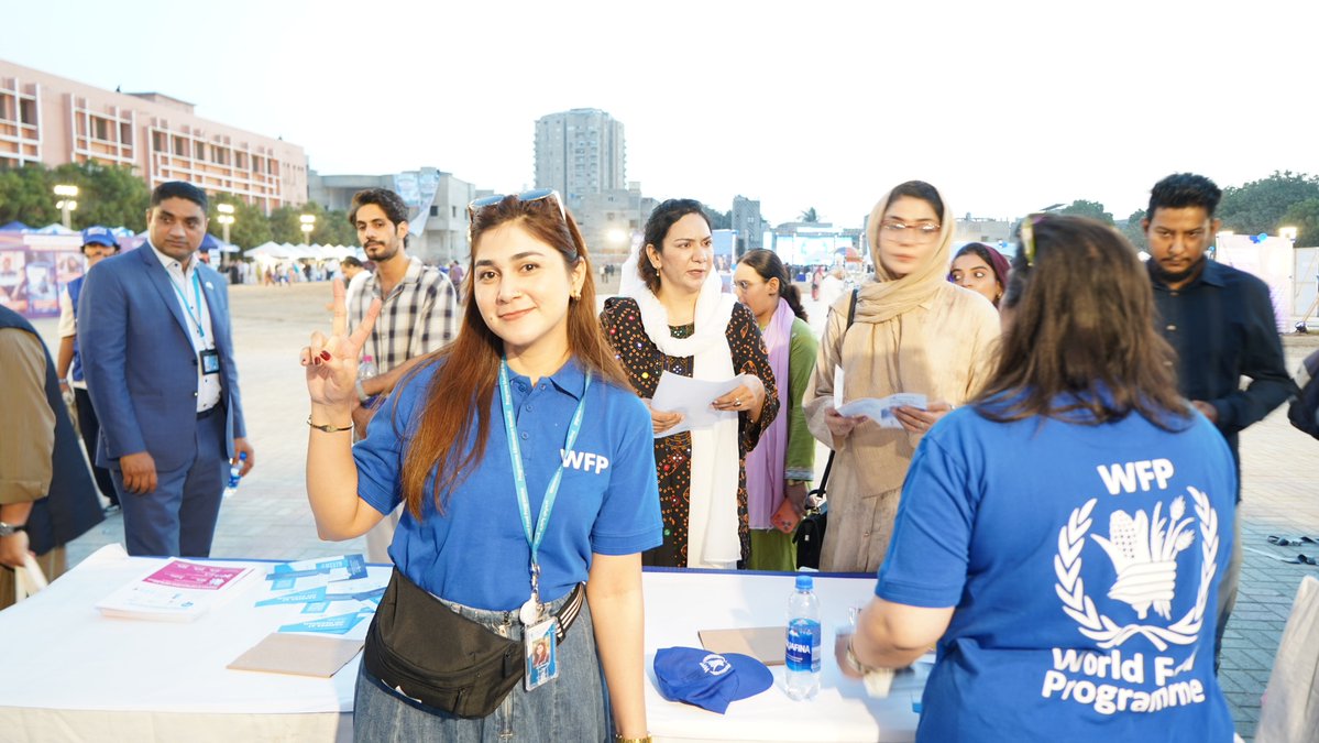 WFPPakistan's tweet photo. What a day, Karachi!🩵UN Day brought people  together for a celebration of learning, laughter and hope. At the WFP stall, visitors shared messages for schoolchildren, took on fun challenges, and explored how our work is building brighter futures across Pakistan https://t.co/kUmg9OTuMs
