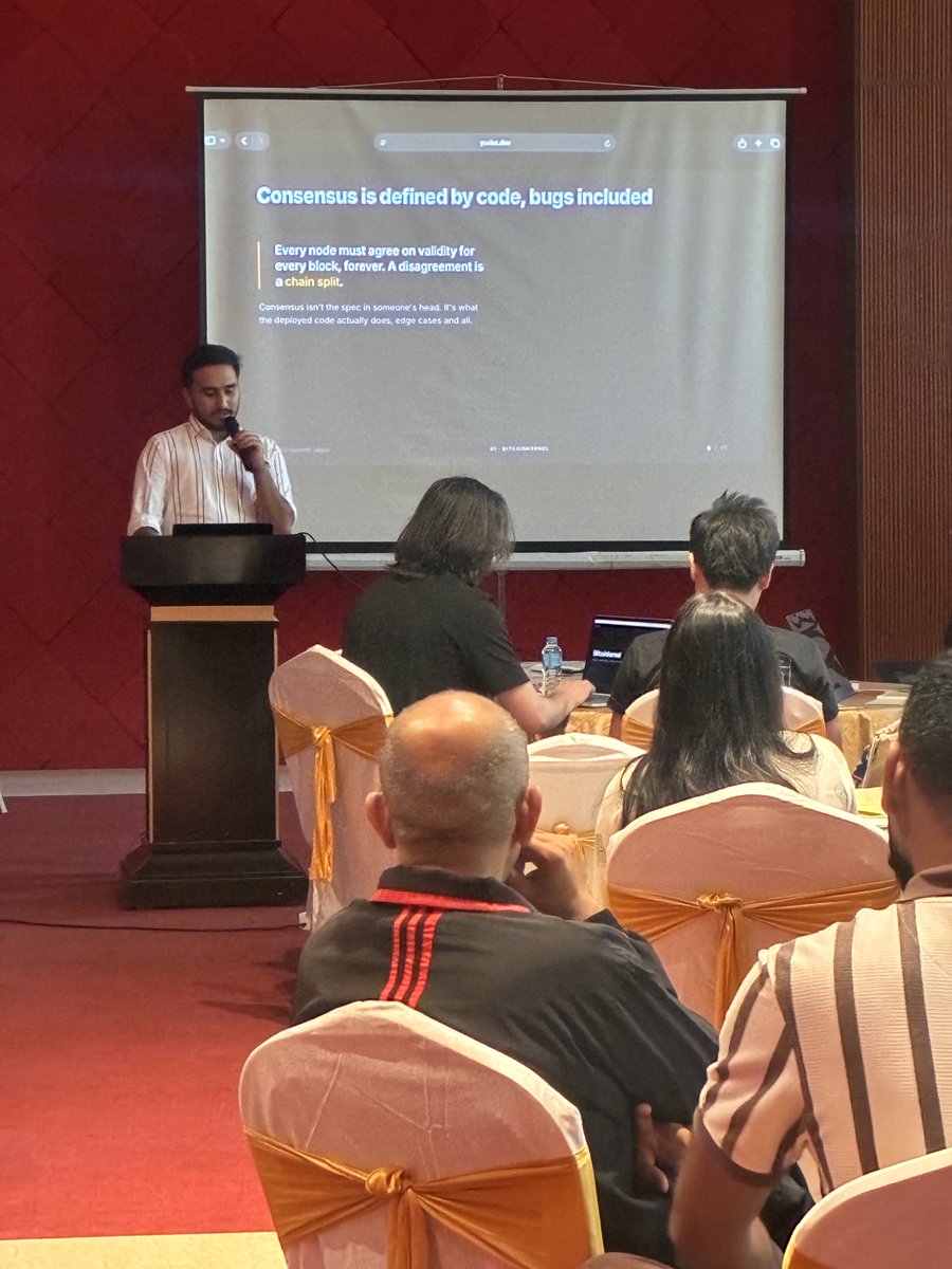 bitshala_org's tweet photo. Now on stage at BOSS Summit: @hey_yuvicc for a hands-on workshop on the @BitcoinKernel project.

Bitcoin Core’s validation engine is being made available as a library, so developers can build their own tools and systems while reusing Core’s consensus code instead of reimplementing it.

The walkthrough goes from validating the first 170 mainnet blocks to verifying Satoshi’s signature, then changing the transaction and watching verification fail.

Less theory, more getting our hands dirty with Bitcoin code.

Workshop code: https://t.co/HDjI5bV0fR