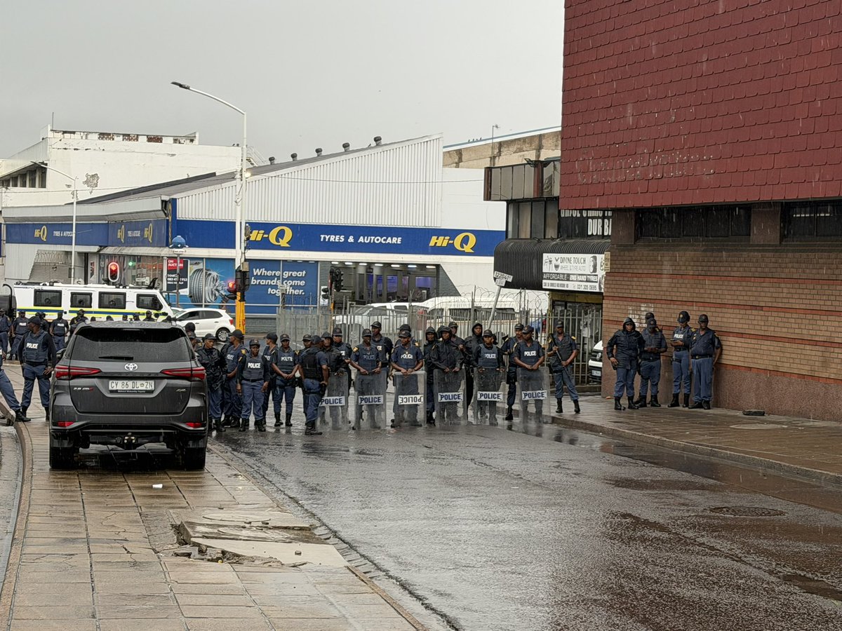 ZANewsFlash's tweet photo. UPDATE: The Durban protesters have been forced to change their route after the police blocked them. https://t.co/lMmBAWtGZm