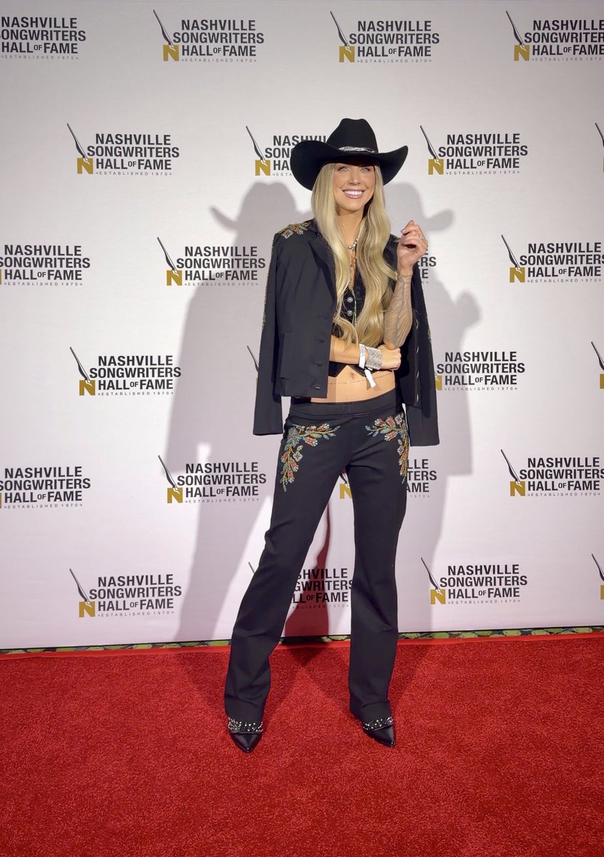 alliwalker's tweet photo. If there’s ever a time for me to be a superfan, it’s around songwriters. I fell in love with country music because of the songwriting. I used to read the liner notes and memorize the names behind my favorite songs, so seeing those people onstage in front of me, several of whom I’ve now had the honor of co-writing with, was pretty surreal.

20 years ago, @taylorswift13 inspired me to start writing songs. Watching her be inducted into the Nashville Songwriters Hall of Fame alongside @GeorgeStrait and so many incredible writers was a full-circle moment I’ll treasure forever.

Thank you to my @ONErpm fam for bringing along this still bright-eyed gal who keeps finding new reasons to chase this dream. This city never stops inspiring me. 🤍