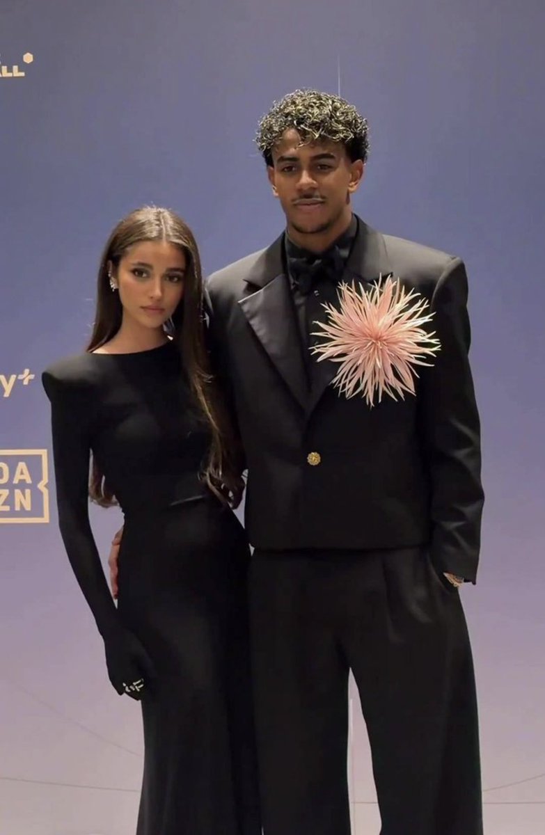 Luchipromax's tweet photo. This pink flower on Lamine Yamal’s chest makes him looks feminine but I know it was his girlfriend’s idea😂 https://t.co/lnOEieMhsU