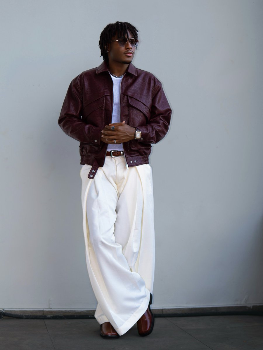 RanksAfrica's tweet photo. Fashion Season: Keivo Is Making a Statement, and He's Styling Himself! 

Keivo is not just wearing fashion. He's creating his own fashion moments!

The BBNaija Season 11 star steps out in a striking burgundy leather jacket, flowing white trousers and matching footwear, delivering a sophisticated blend of contemporary streetwear and effortless elegance.

And here's what makes this look even more interesting: Keivo styled himself! 

From the colour combination to the relaxed silhouette and carefully selected accessories, every detail speaks to his growing confidence and personal sense of style.

The fashion era is looking good on Keivo, and we're here for it! 

As he perfectly puts it: “Let the details do the talking. I'm just wearing the conversation.”

Styling: @keivo_oi
Photography: thatboimerrick