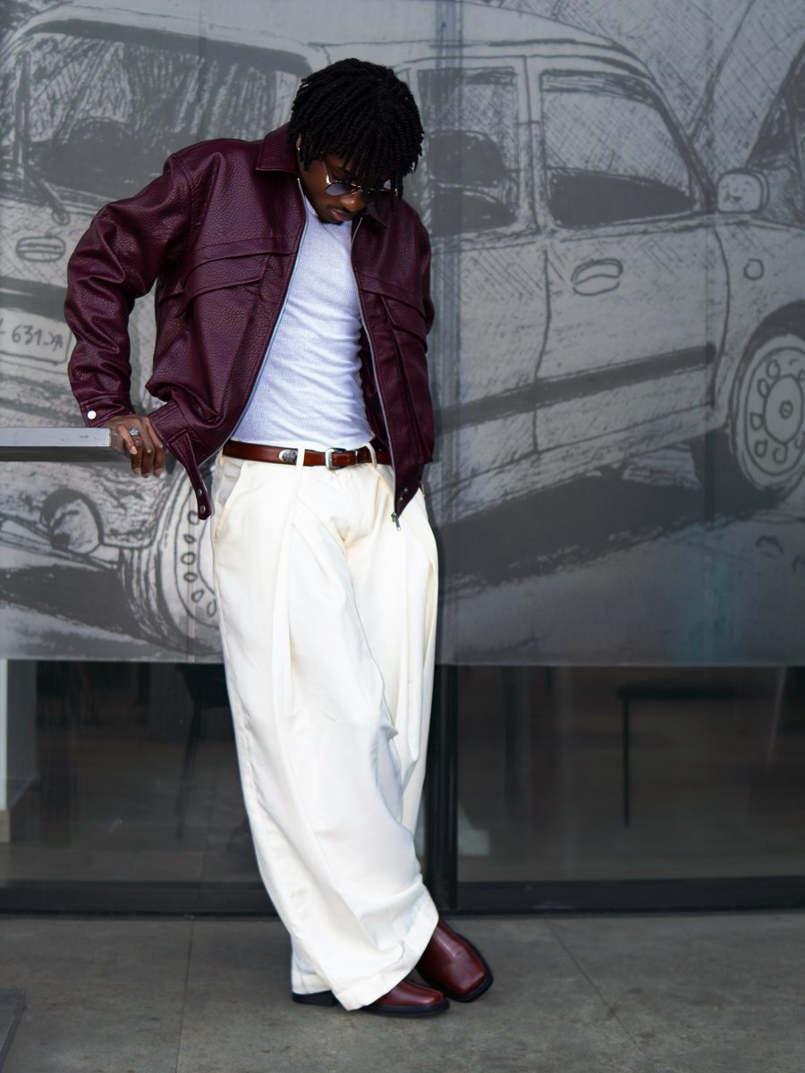 RanksAfrica's tweet photo. Fashion Season: Keivo Is Making a Statement, and He's Styling Himself! 

Keivo is not just wearing fashion. He's creating his own fashion moments!

The BBNaija Season 11 star steps out in a striking burgundy leather jacket, flowing white trousers and matching footwear, delivering a sophisticated blend of contemporary streetwear and effortless elegance.

And here's what makes this look even more interesting: Keivo styled himself! 

From the colour combination to the relaxed silhouette and carefully selected accessories, every detail speaks to his growing confidence and personal sense of style.

The fashion era is looking good on Keivo, and we're here for it! 

As he perfectly puts it: “Let the details do the talking. I'm just wearing the conversation.”

Styling: @keivo_oi
Photography: thatboimerrick