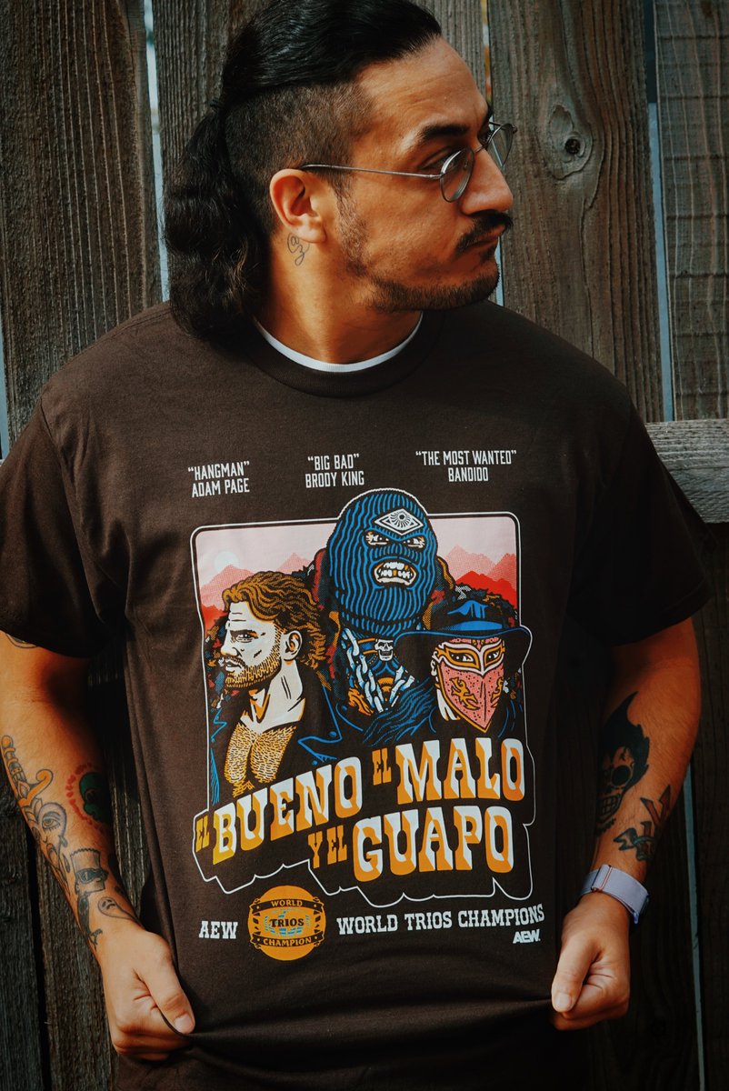 PWTees's tweet photo. Grab this limited edition Hangman Page &amp; Brodido Top Rope Tuesday - El Bueno El Malo y El Guapo shirt on Pro Wrestling Tees. Available for 1 Week Only (until 11/3)
https://t.co/K0npIjJzNo https://t.co/BdKyluKaNb
