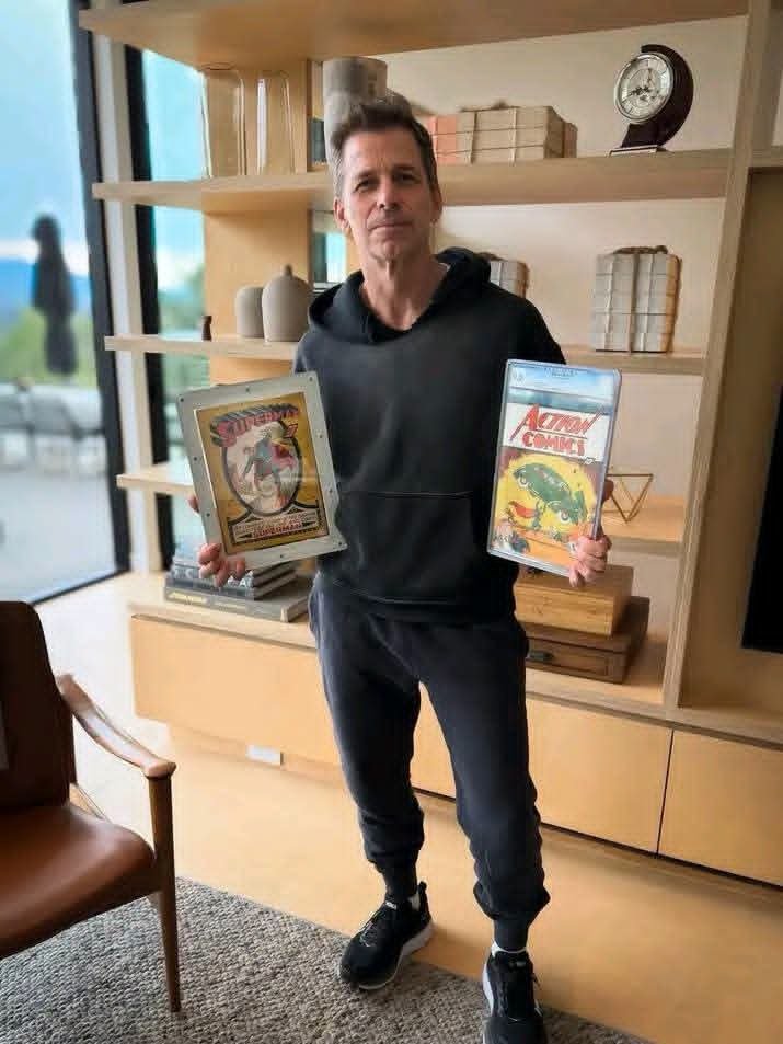 HallOfSV's tweet photo. Zack Snyder holding some of the earliest Superman comics. https://t.co/kr8Y9xdlMQ