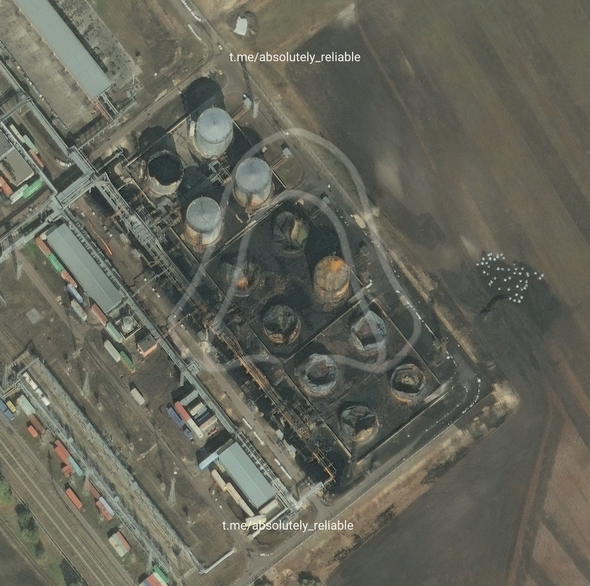 NOELreports's tweet photo. Satellite imagery released by ABSreliable shows the aftermath of the October 10 strike on the Yug Rusi oil terminal near Bataysk in Russia’s Rostov region. Eight storage tanks were destroyed, while three more were scorched and are unlikely to return to service soon. #Russia https://t.co/dM3DZf62wC