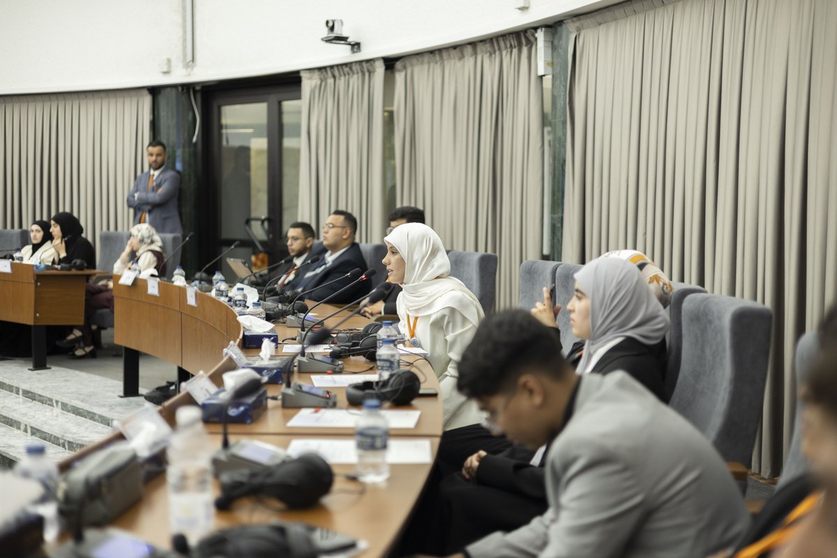 UNSMILibya's tweet photo. Fifty young men and women from across Libya took part in a three-day Model United Nations (MUN) in Misratah from 24-26 October to mark UN Day. Held in collaboration with the Libyan Debate and Dialogue Association (DDA), the MUN focused on increasing understanding of the mechanisms of the UN and building young people's skills in critical thinking and negotiation.

Deputy Special Representative of the Secretary-General, Political, Stephanie Koury joined participants on the second day, briefing the UN Security Council simulation and taking questions from the participants taking part in the [model] UN General Assembly and Economic and Social Council simulations.

"It was a new experience for me in Libya, and one of the most beautiful I’ve ever had," said one male participant. "The most valuable takeaway for me was drafting a position paper; it required me to delve deep and truly understand the stance of the country I was representing before speaking on its behalf."

"During the conference itself, I learned to listen attentively, respond with composure and diplomacy, and advocate for a position, even when it differed from my own personal views. I also had the chance to meet young people from various Libyan cities, which allowed me to see challenges and crises from entirely new perspectives," he added.

🔗 Read more:

https://t.co/7XtUCqbbpi