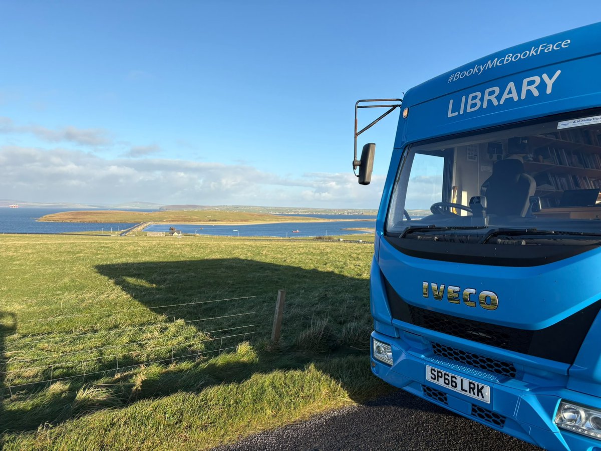 OrkneyLibrary's tweet photo. After what seems like days and days of wet and windy weather, blue skies have returned and #BookyMcBookface is away across the Churchill Barriers to the beautiful islands of Burray and South Ronaldsay. 📚 https://t.co/cdoaTcE0WK