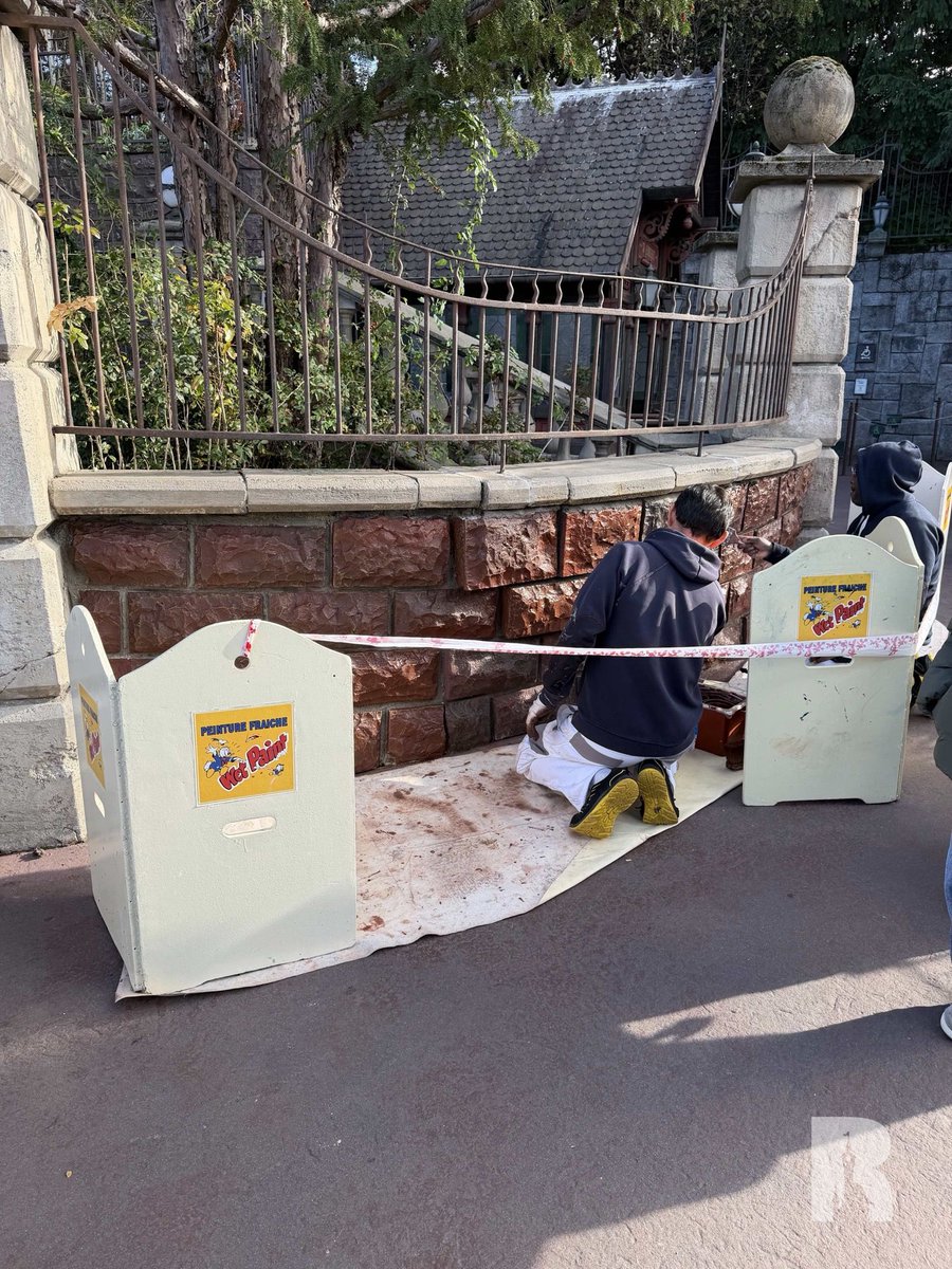DLPReport's tweet photo. 🔧 Painting in progress for the Phantom Manor fence rockwork: https://t.co/kz4wCALstJ