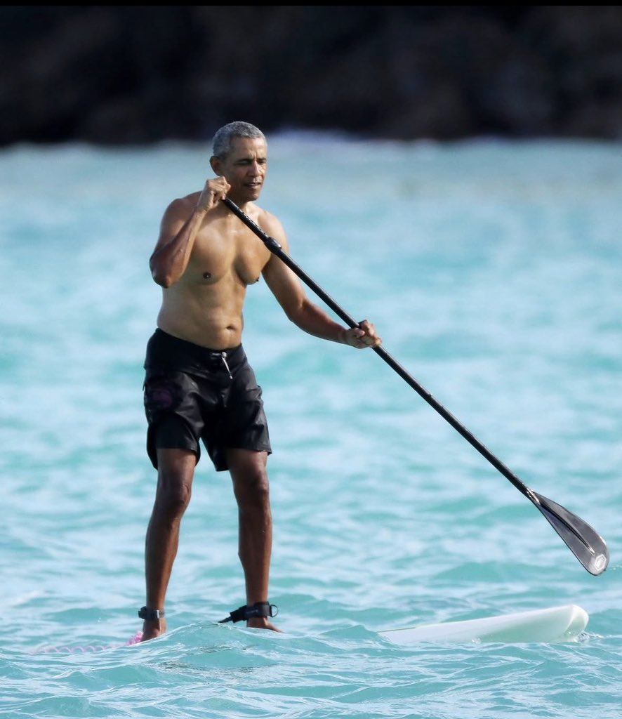 Samsonthegoat25's tweet photo. Barack Obama spotted paddleboarding in the ocean with a mystery woman. https://t.co/zSqvvc0AIf