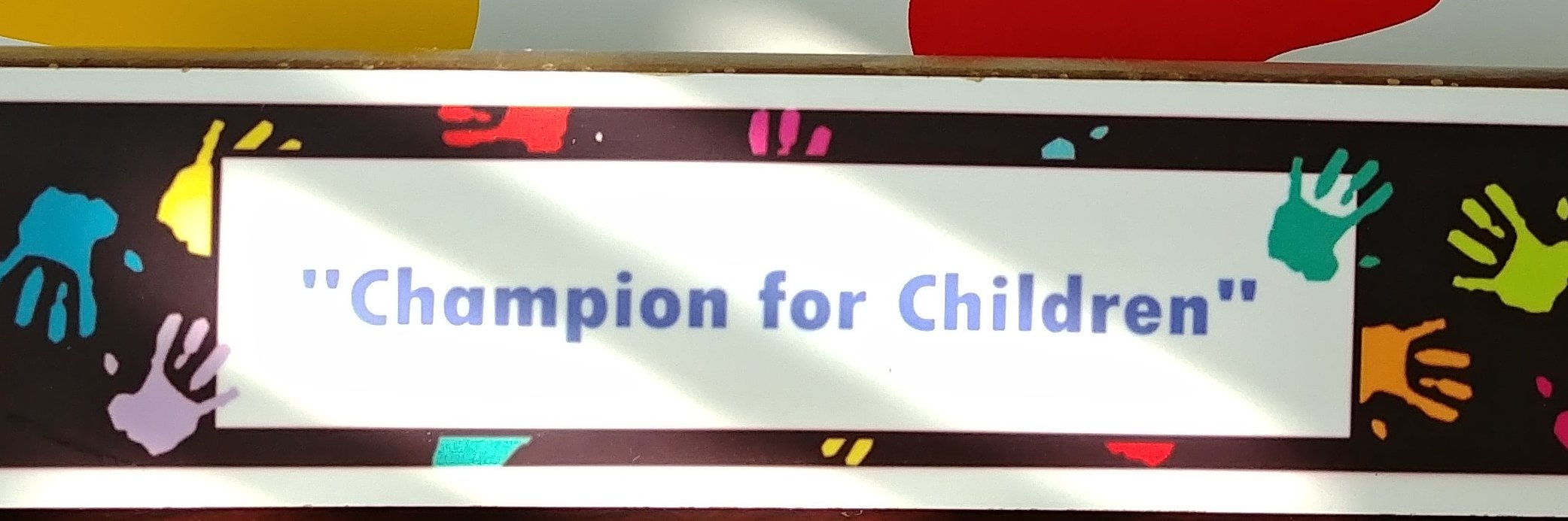 "Champion for Children" banner