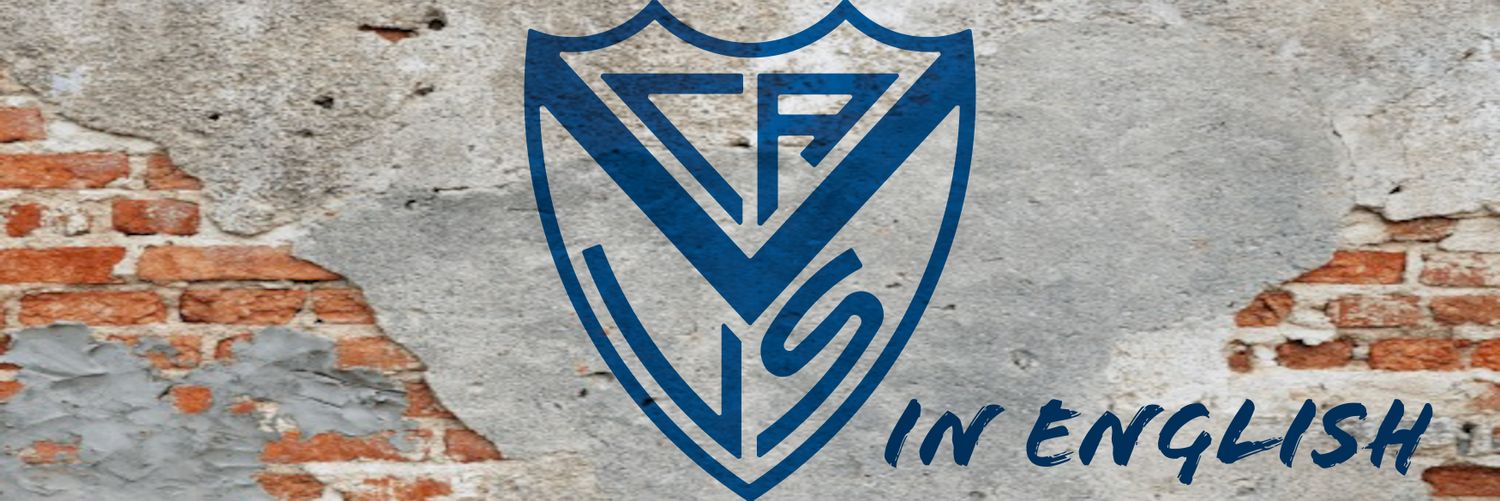 Vélez in English banner