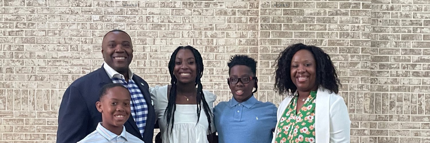 T (he/him/his) banner