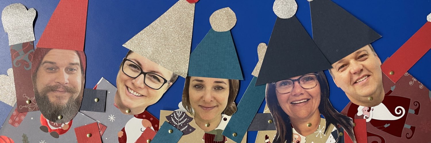 Kinderland with Mrs. Burns & Mrs. Shire banner