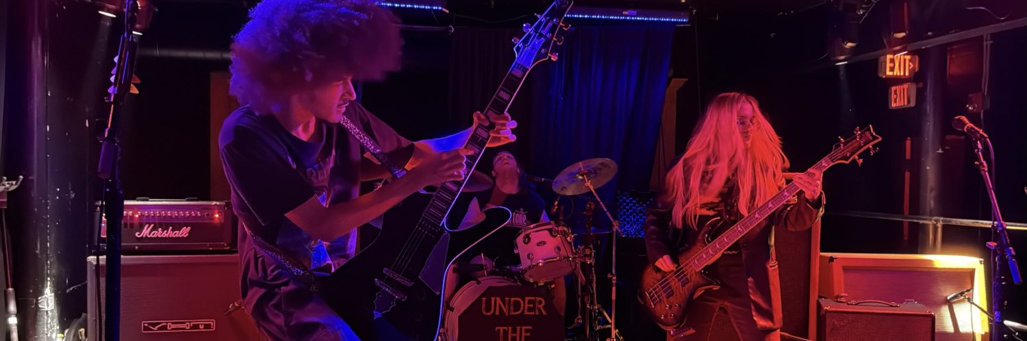 Under The Horizon banner