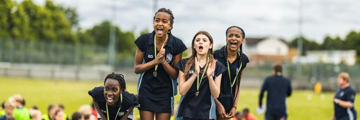 The John Warner School banner