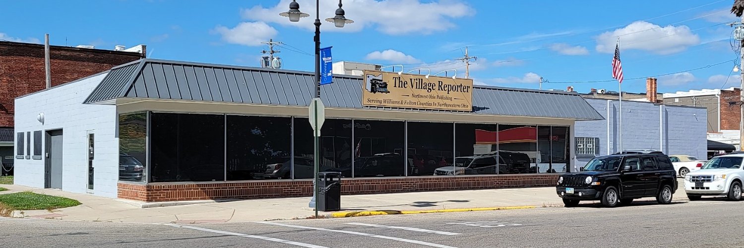 The Village Reporter banner