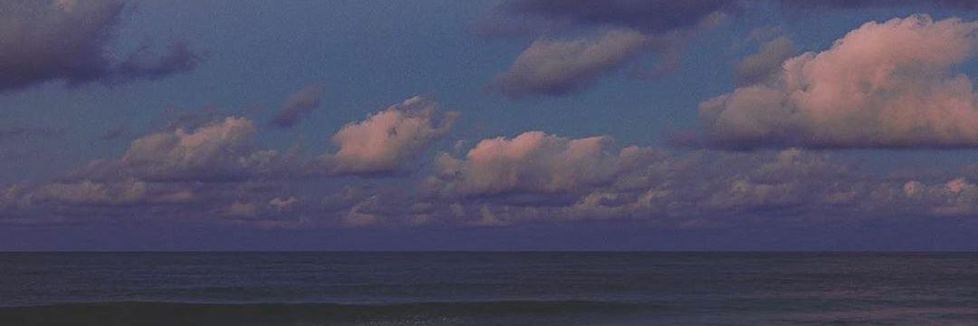 J I N banner