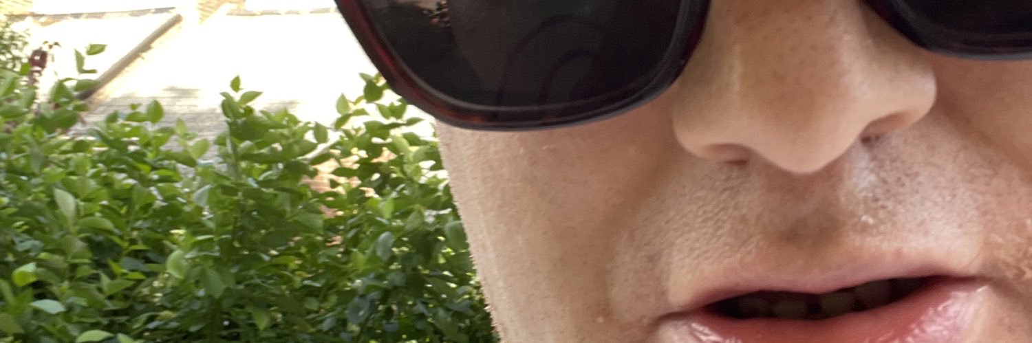 Alex Gibbons lights camera debate banner