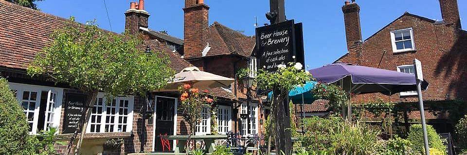 The Queen Inn // Pub & Microbrewery banner