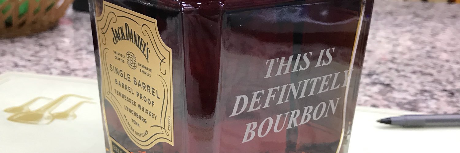 J Benny's banner