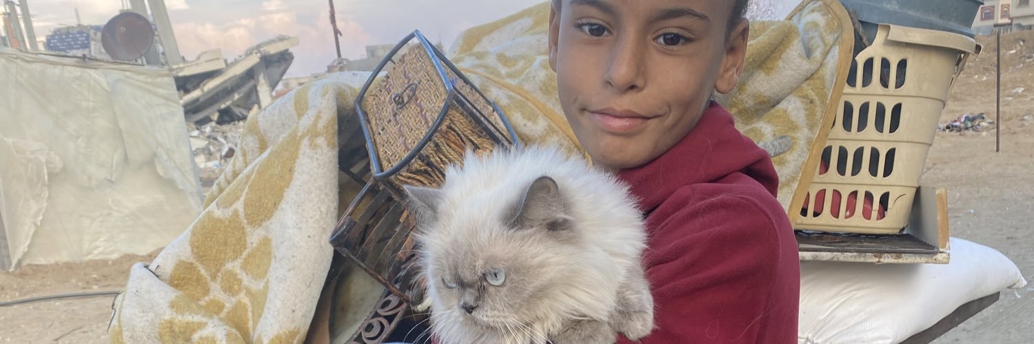 Ahmed in Gaza's banner