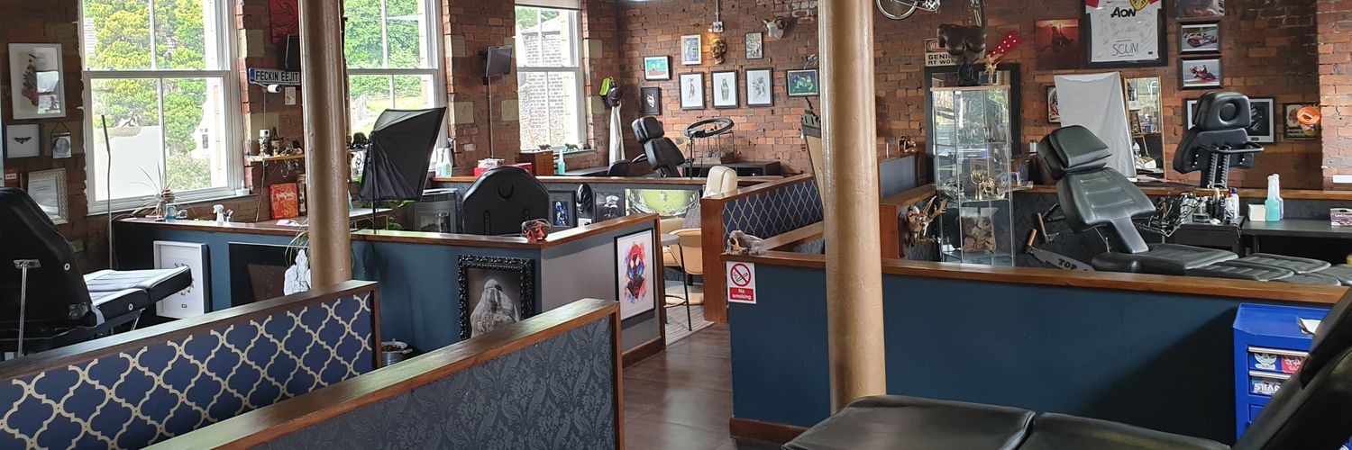 Slawit Ink Tattoos banner