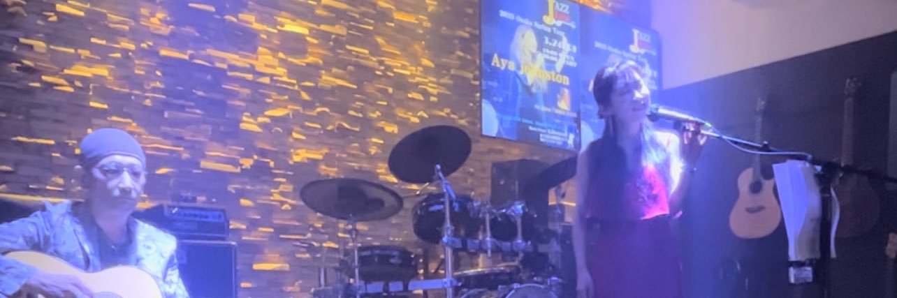 Aya Johnston🎙️🐈‍⬛ banner