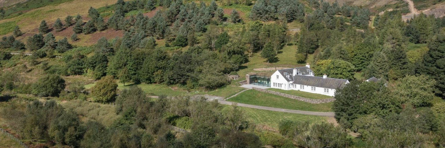 Robert McQueen banner