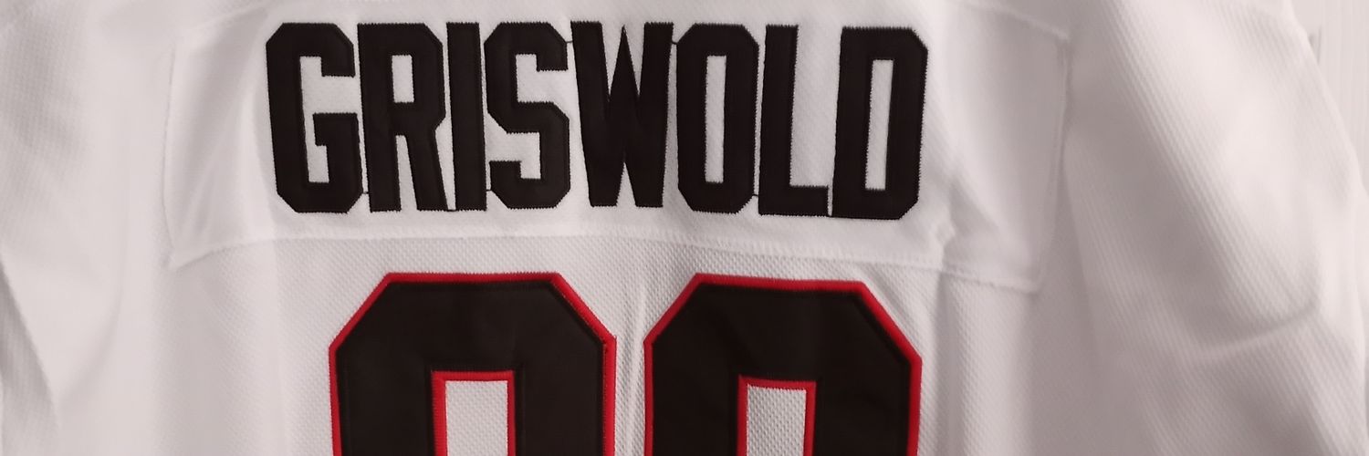 Robert P Caine banner