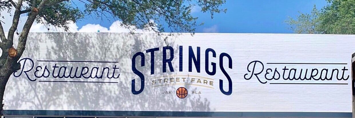 Strings Sports Brewery banner