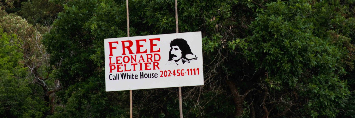 LEONARD: Political Prisoner banner