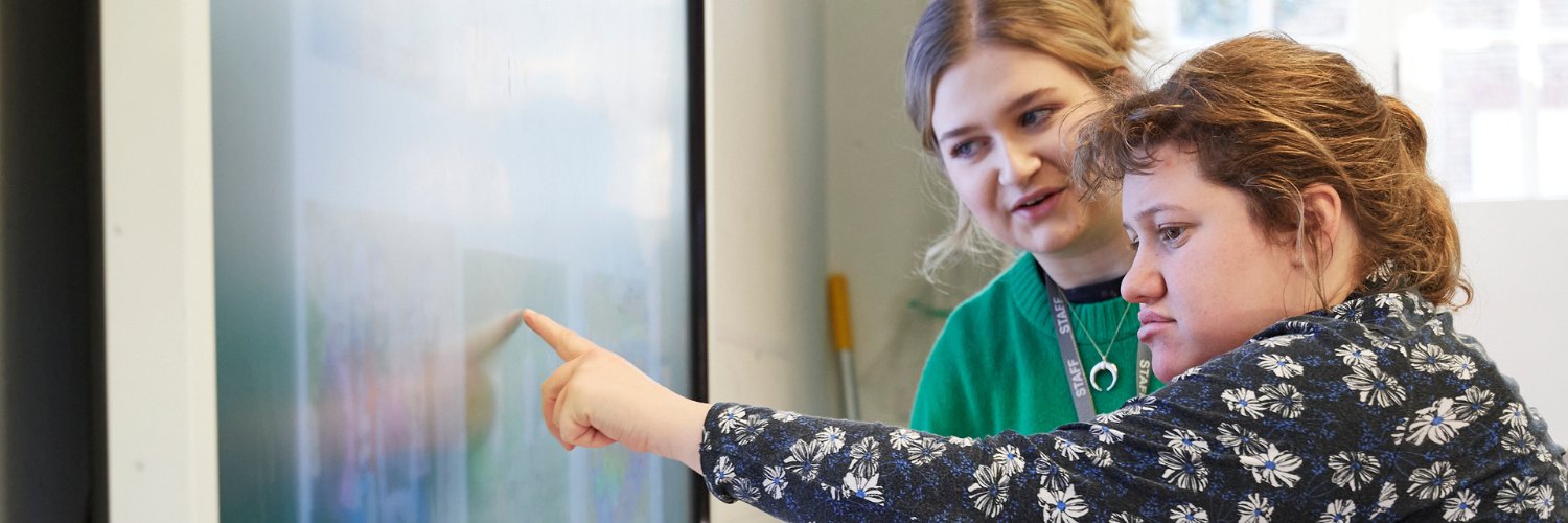 Ambitious College banner