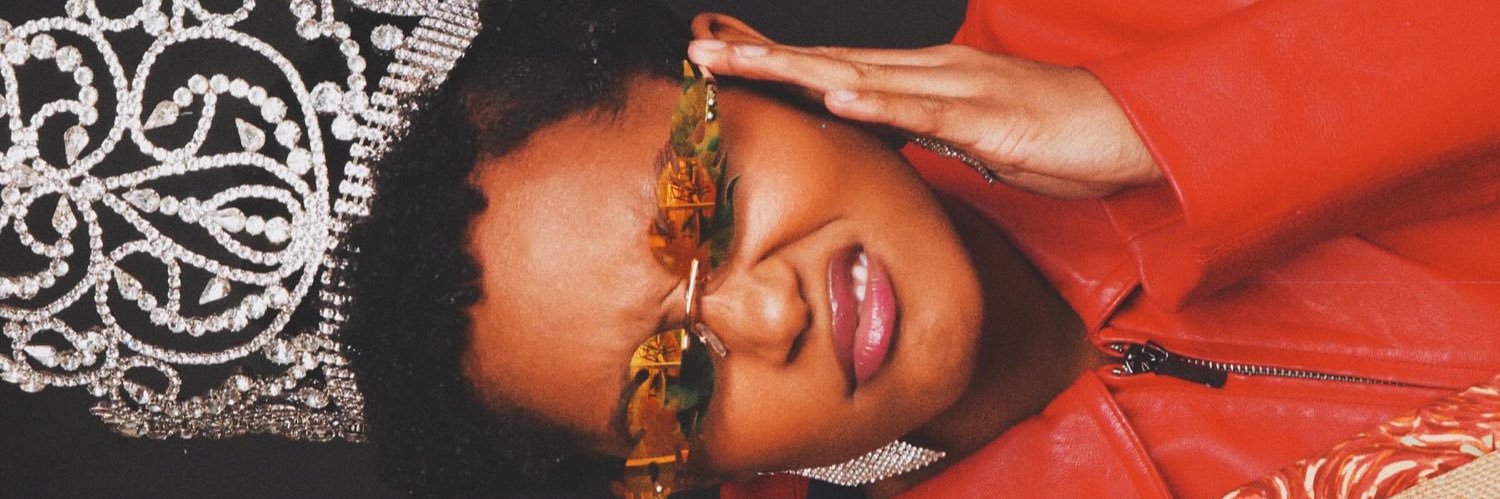 DoMonique Warren banner