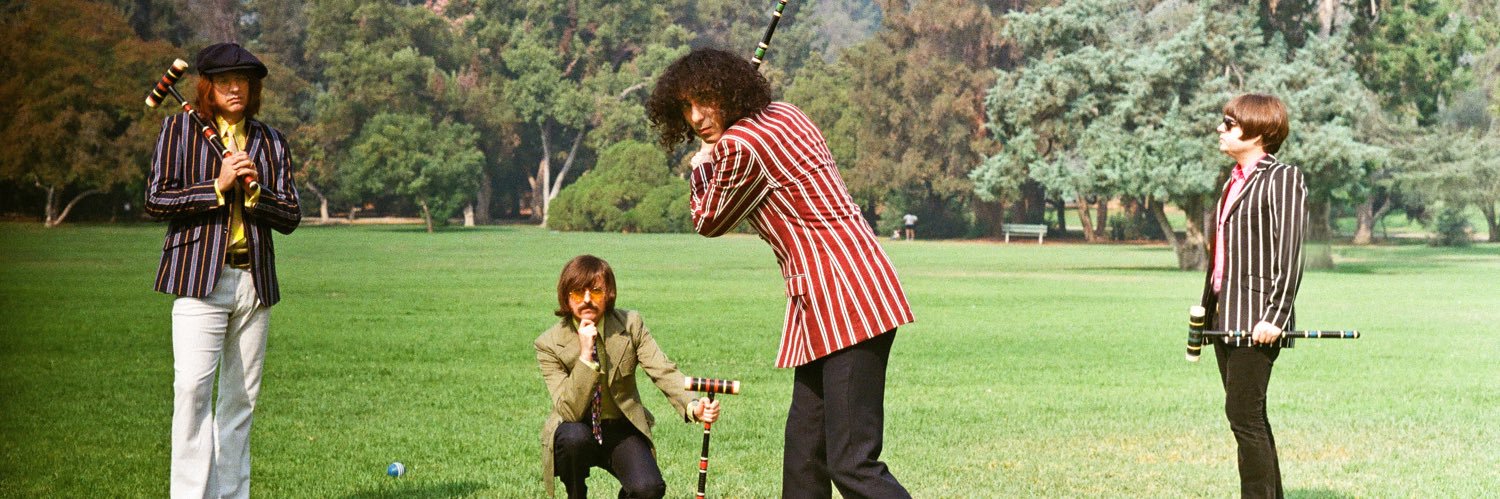 Electric Looking Glass banner