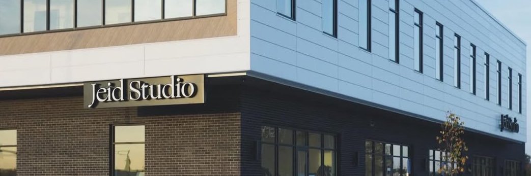 John Economos banner