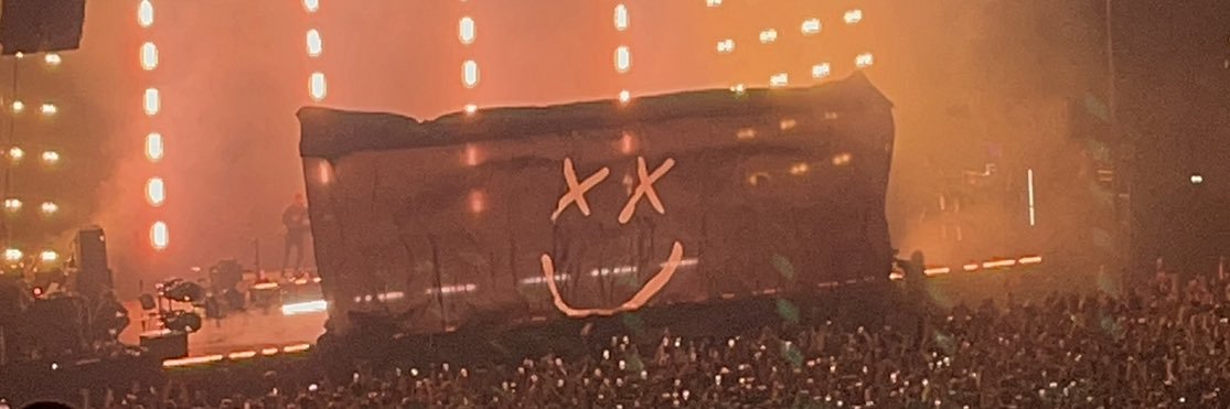 Nikita held louis’ hand banner