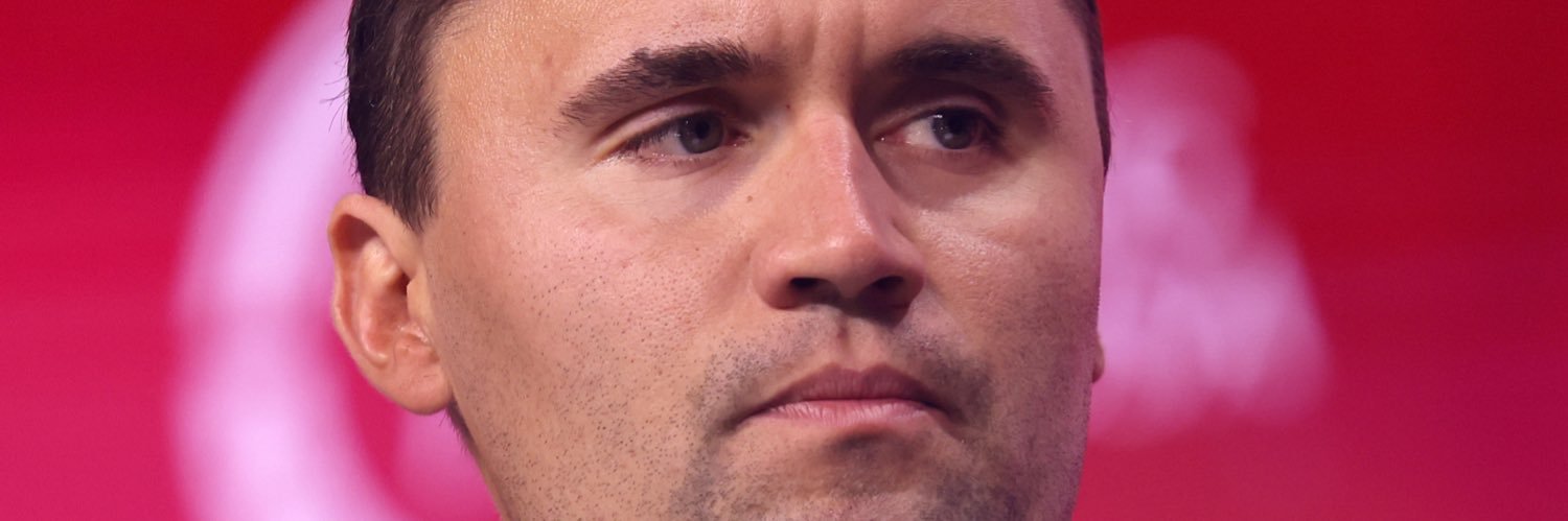 Mick Schuster banner