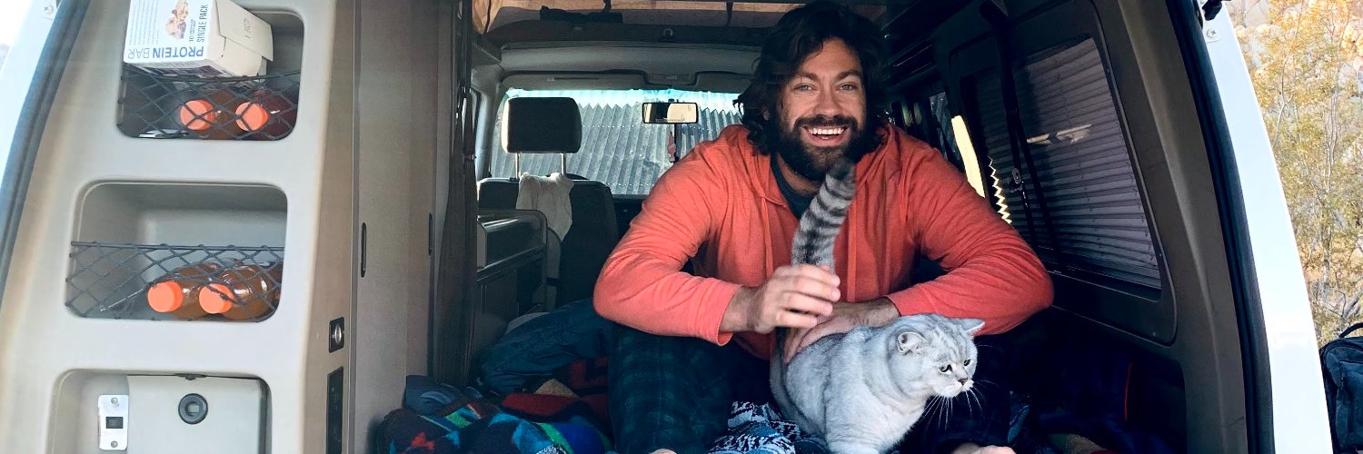 The Traveling Cat Dad banner