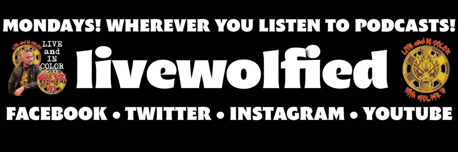 LIVE and IN COLOR with Wolfie D's banner