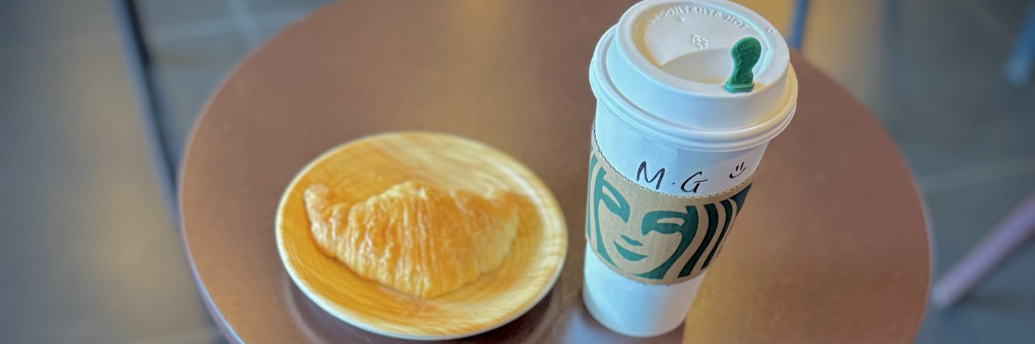 M G banner