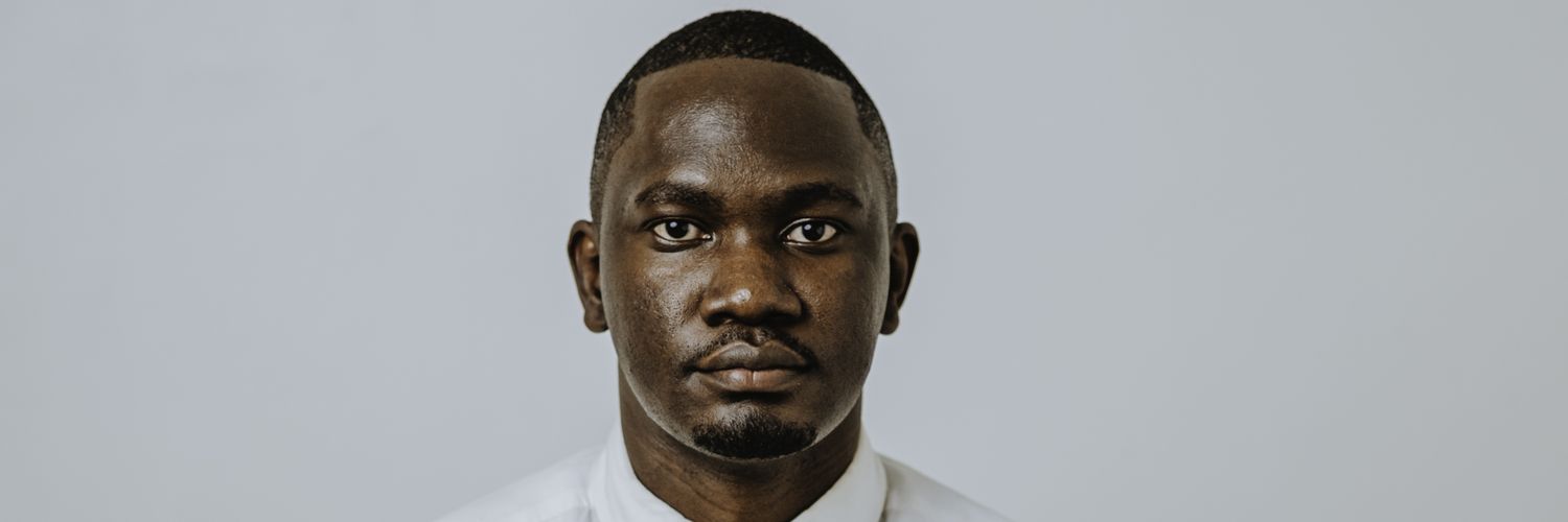 Patrick Ssemwogerere banner