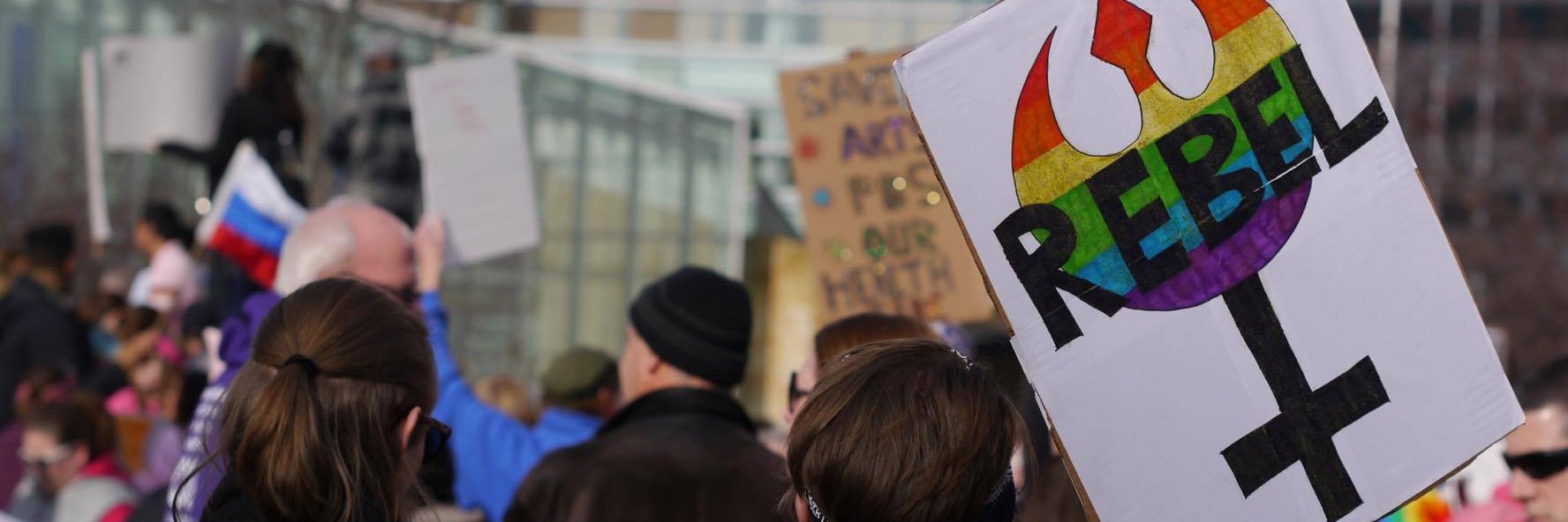 katie, from the shadows banner