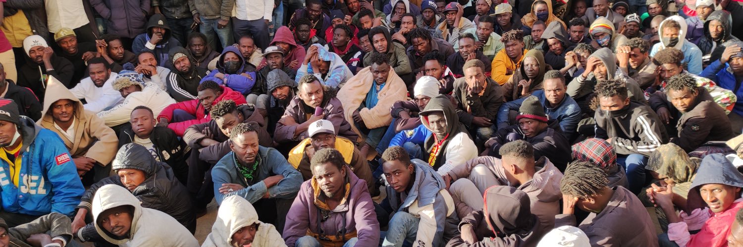 Refugees In Libya's banner