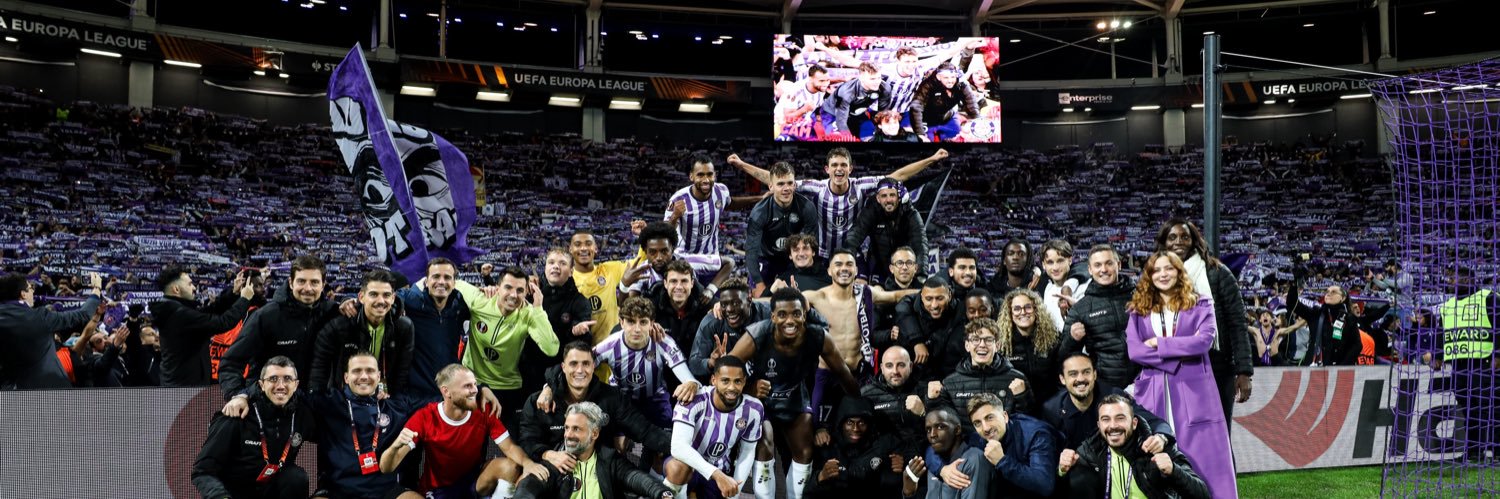 The ✞ banner