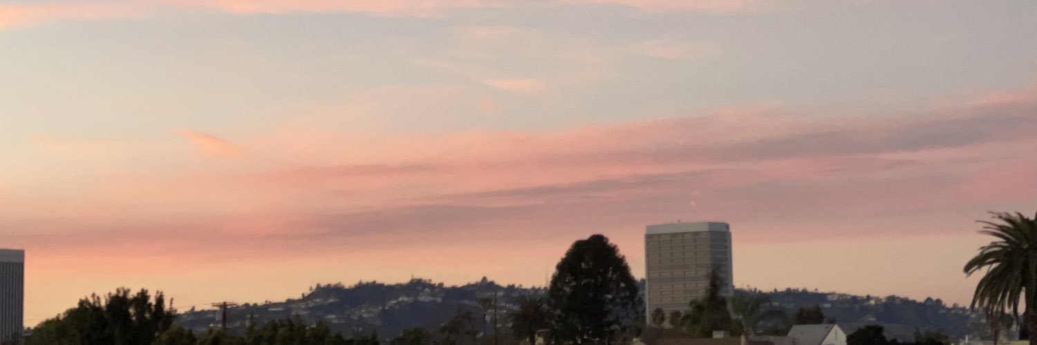 Kat Hennessey she/they banner